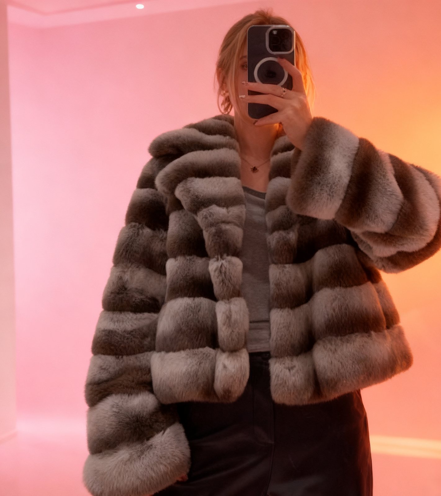 Model in full-length ranch mink coat